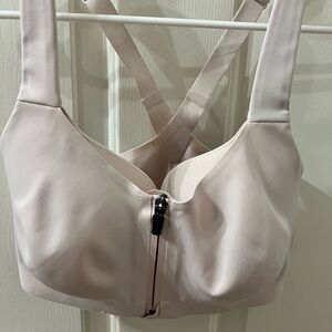 Victoria’s Secret sports bra with front snap and zipper closure. Size 32DDD